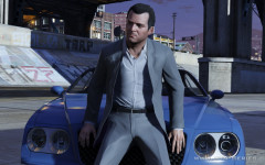official screenshot michael sits on a car